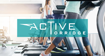 Active Torridge Logo Gym in front of People on Treadmills