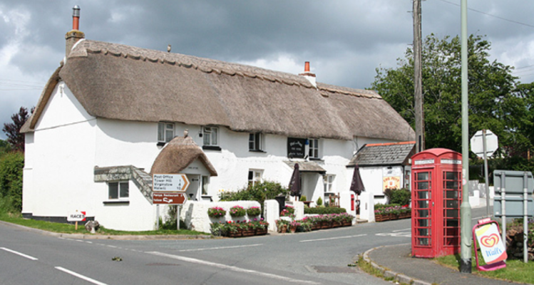 Pub and phone box in Broadheath ward