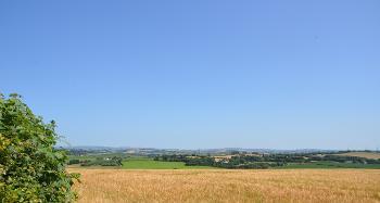 DCA 53: Views from west of George Nympton across arable fields and pasture over South Molton to Exmoor on the horizon.