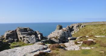 Figure 2.4: Picture of granite formations, white rock, taken from the top of cliffs with the sea in the background.