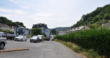 LCT 4C Car park and mixed traditional and modern residential properties at Hele Bay