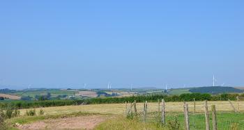 LCT 5C Elevated open farmland with views west towards Fullabrook Down wind farm and the coast beyond.