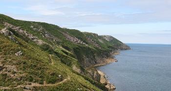 LCT 6 Vegetated cliff slopes with rocky coves on the eastern side of the island.
