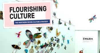 Poster for Flourishing Culture with the background being butterflies and colourful bugs