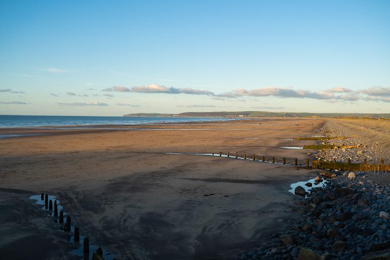 Photo of Westward Ho! beach, at early sunset. 
