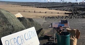 Sign on the beach saying Beach Clean