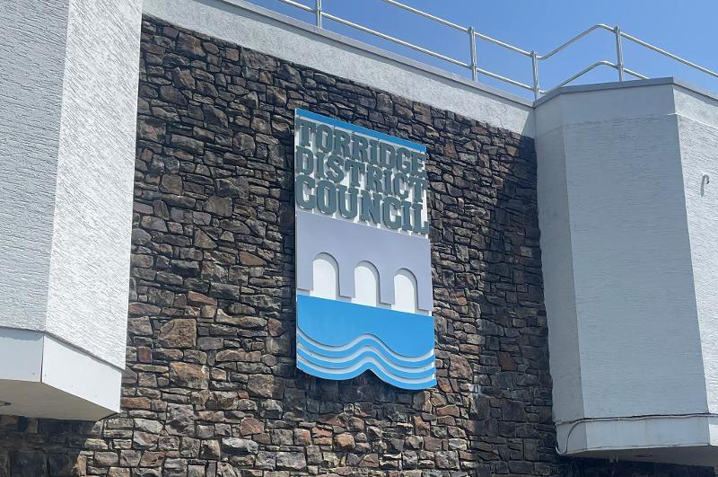 Picture of the Torridge Logo on the front of Riverbank House