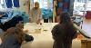 People taking part in an art workshop, drawing etc.